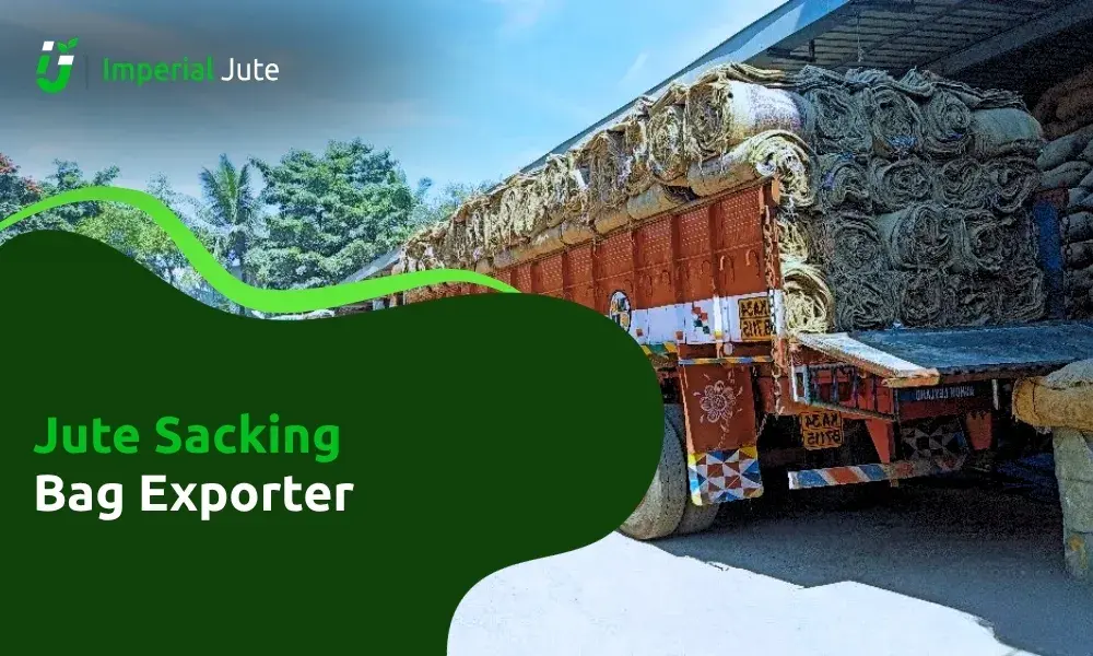 Truck loaded with jute sacking rolls.